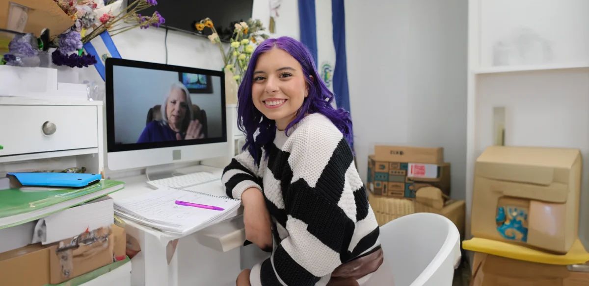 student smiling at home